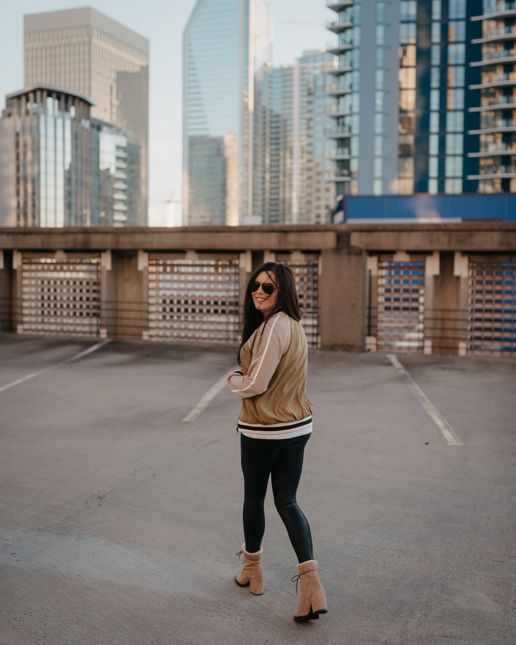 clean chic sophisticated style with bomber jacket, leggings and booties